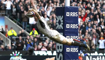 Chris Ashton dives into the record books as England punish Italy