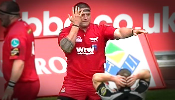 Prop Rhys Thomas scores then celebrates like a back